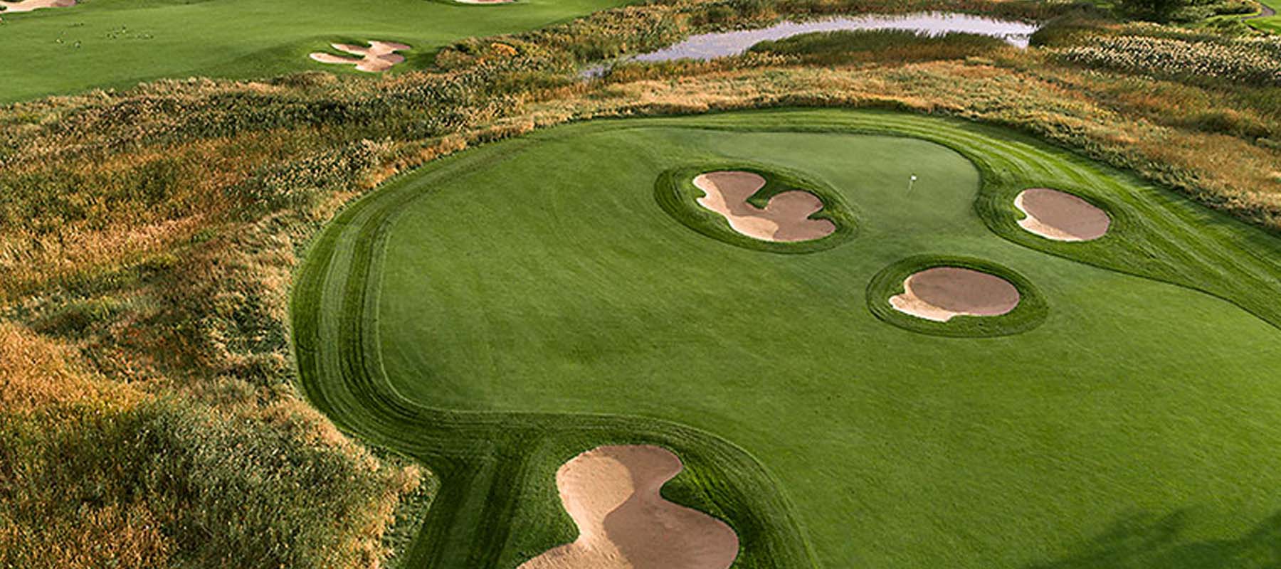 golf fairway with sand dunes